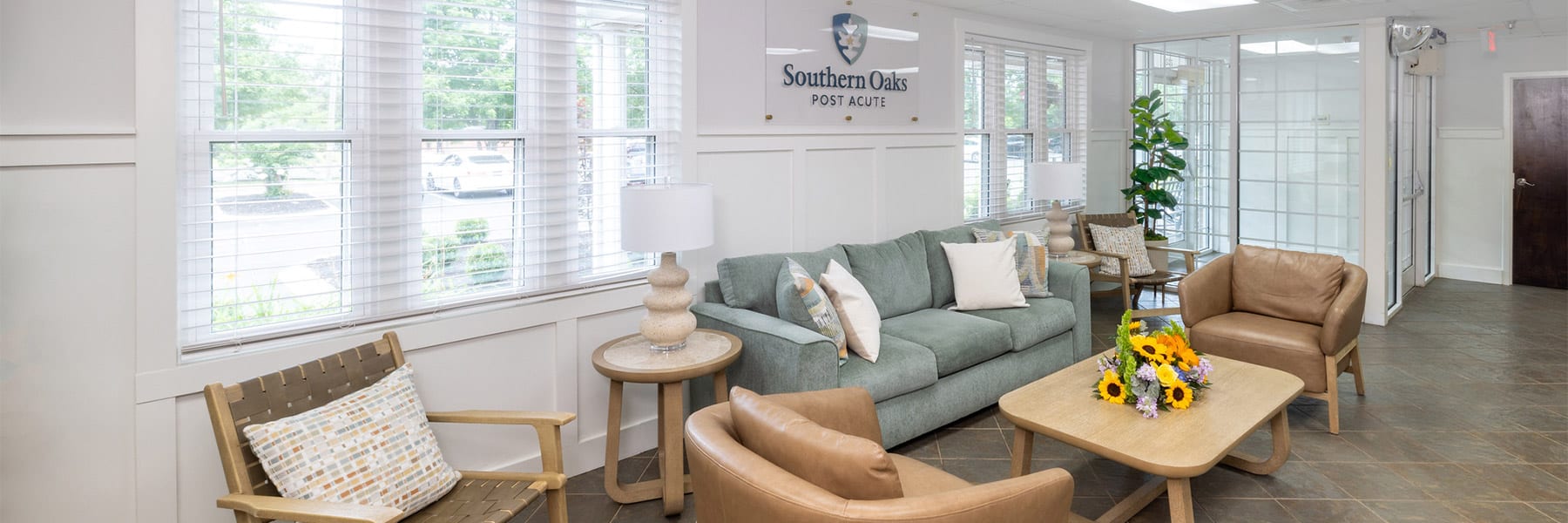 Lobby with couches at Southern Oaks Post Acute